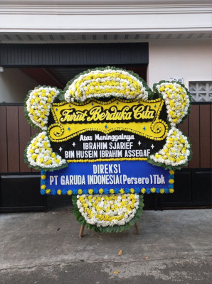 Papan Bunga Duka di Komet