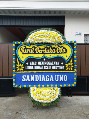 Papan Bunga Duka di Komet